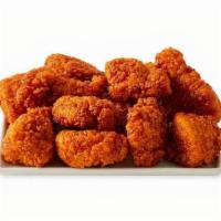12 Pc Boneless · Hand-brushed with your choice of a Bonchon Signature Sauce.  Complimentary side of pickled r...