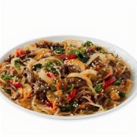 Japchae · Marinated ribeye stir fried with fresh vegetables and our famous Soy Garlic sauce mixed with...