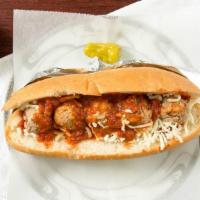Meatball Sub · Meatballs covered in meat sauce and melted mozzarella cheese.