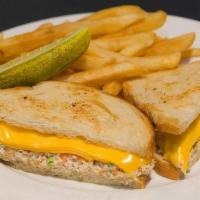 Tuna Melt Sandwich · Albacore tuna salad melted with American cheese on sourdough bread.
