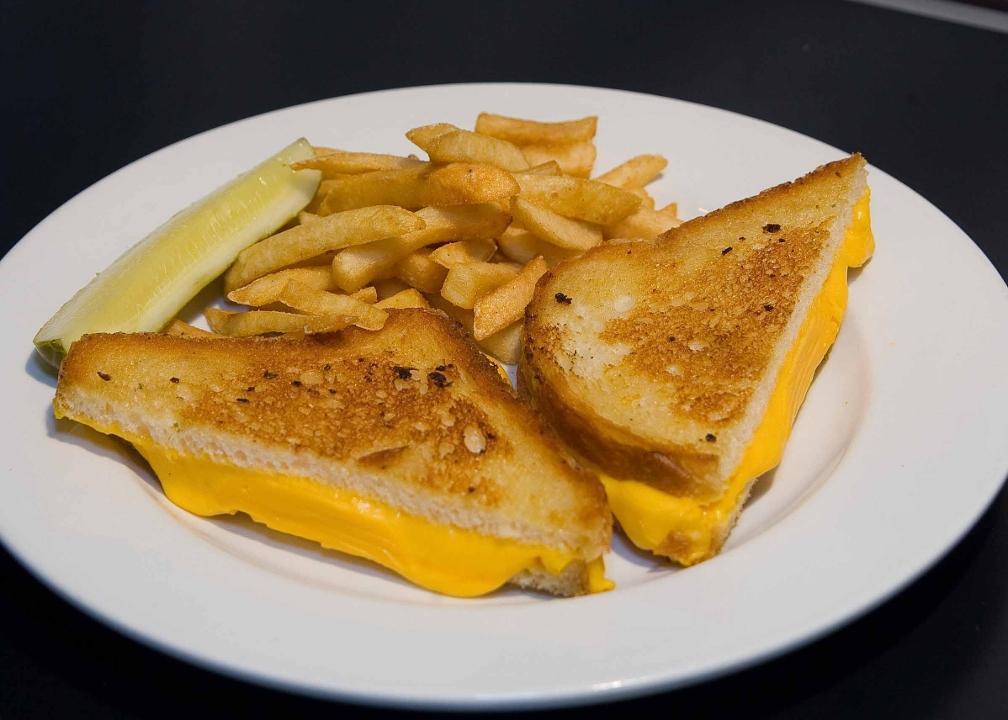 Grilled Cheese Sandwich · Melted American cheese on grilled sourdough.