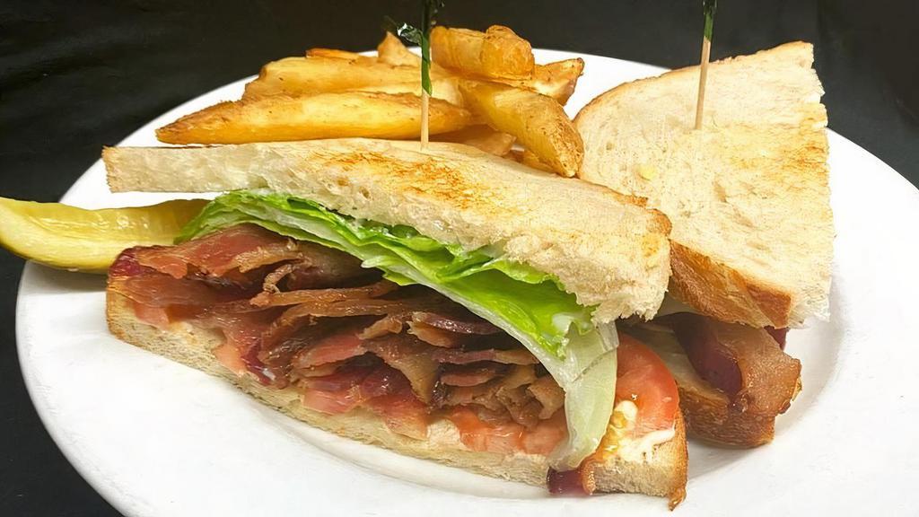 The Blt Sandwich · Heaps of bacon, lettuce, tomato and mayo served on sourdough.