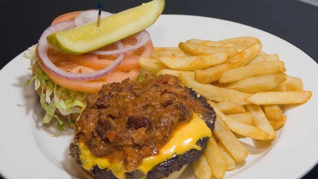 Chili Cheese Burger · Topped with homemade chili con carne and cheddar cheese.