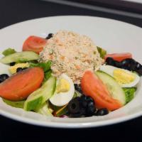 Tuna Salad · White albacore tuna salad served with a. hardboiled egg, cucumbers, tomatoes, and black. oli...