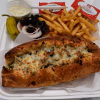 Philly Cheese Hot Combo Steak Sandwich · Available with chicken. Cheese, onions, mushrooms, and bell peppers.