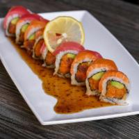 Girls Night Roll · IN: spicy tuna, avocado
TOP: salmon, tuna
mustard seed dressing