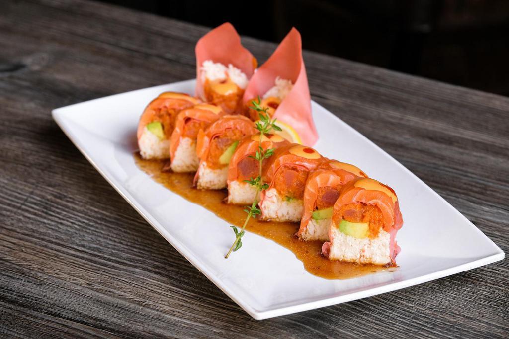 Pink  Panda Roll (No Rice) · IN: spicy tuna, avocado, imitation crab wrapped with soy paper
TOP: salmon. 
mustard seed dressing, spicy mayo, hot sauce