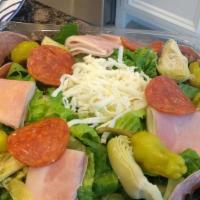 Antipasto Salad · Crisp romaine hearts with genoa salami, mozzarella, provolone, hot coppa ham, sautéed mushro...