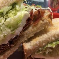Blt Sandwich · Includes lettuce, tomato, onion, mustard, mayonnaise, and cheese.