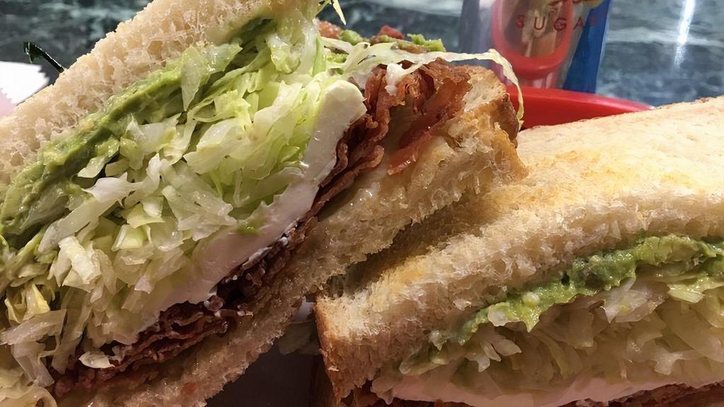 Blt Sandwich · Includes lettuce, tomato, onion, mustard, mayonnaise, and cheese.