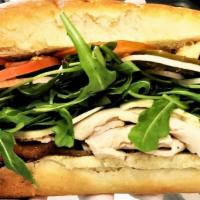 Hot In The Club · Turkey, bacon, pepper jack, arugula, tomato, onion, spicy aioli, mayo, house pickled jalapen...