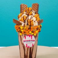 Chocolate Peanut Butter Crunch Shake · Chocolate peanut butter milkshake, homemade whipped cream, peanut butter, Reese's pieces and...