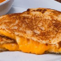 Grilled Cheese On Sourdough · Grilled cheese made with cheddar cheese on sourdough.
