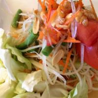Papaya Salad · Shredded young green papaya with carrot, green bean, tomato in spicy fresh lime juice dressi...