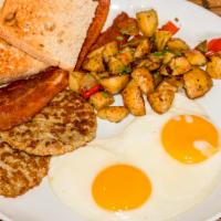 Colette Breakfast · Two eggs, bacon, sausages, roasted potatoes, and toast. Consuming raw food or undercooked me...