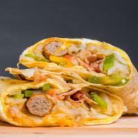 Combo Burrito · Flour tortilla with scrambled eggs, hash browns, bacon, sausage, grilled onions, grilled pep...