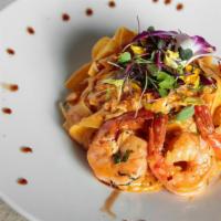 Pappardelle Alla Vodka E Gamberi · Large ribbon pasta with jumbo shrimp and dungeness crab meat in a pink vodka sauce.