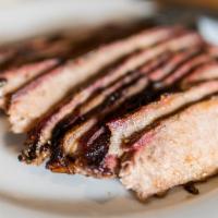 Sliced Beef Brisket · (Choice of lean or juicy) seasoned and slow-smoked for up to 14 hours.