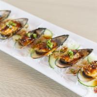 Baked Green Mussels (6 Pieces) · New Zealand green mussels with dynamite sauce, masago, and green onion.