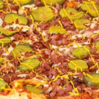 Pastrami Pizza · Pizza sauce, mustard, cheese, pastrami, pickle.