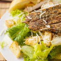 Chicken Caesar Salad · Romaine lettuce asiago cheese and croutons tossed in lemony caesar dressing.