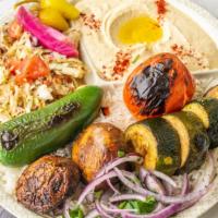 Veggie Kabab Plate · Vegan. Grilled zucchini, mushroom, tomato pepper with rice, hummus, cabbage salad, pickles a...