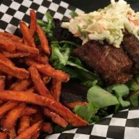 Meat & Greens · Your choice of meat served on fresh greens topped with our famous homemade coleslaw.