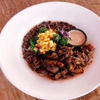 Brazil Bowl · Served with coconut rice, black beans, and steamed purple and green kale, topped with mango ...