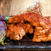 Spicy Karaage (6Pcs) · Japanese style fried chicken with Fukumi special spicy sauce topped with shredded red pepper