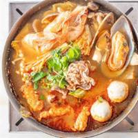 Thai Flavor Hot Soup · Napa cabbage, pork slices, enoki mushroom, brown beech mushroom, vermicelli, calamari, fuzho...