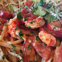 Crawfish Pasta · Chunky crawfish, spicy sausage, house tomato cream marinara sauce.
