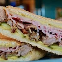 Cuban Sandwich Combo · Carnitas, Ham, Dill Pickles, Dijon, and Swiss on Telera Bread