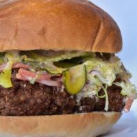 Classic Fried Chicken Sandwich · Creamy Coleslaw, Smoked Aioli, and Pickles (Allergies: Garlic/Bulb, Gluten, Dairy)