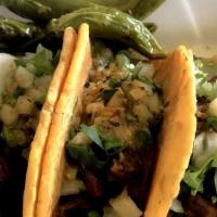 Carne Asada Taco · With guacamole & pico de gallo.