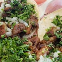 Taco Plate · With meat, rice & beans.