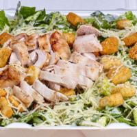 Chicken Caesar Salad · Fresh Romaine lettuce, Chixy's Caesar dressing, Parmesan cheese, croutons and sliced boneles...