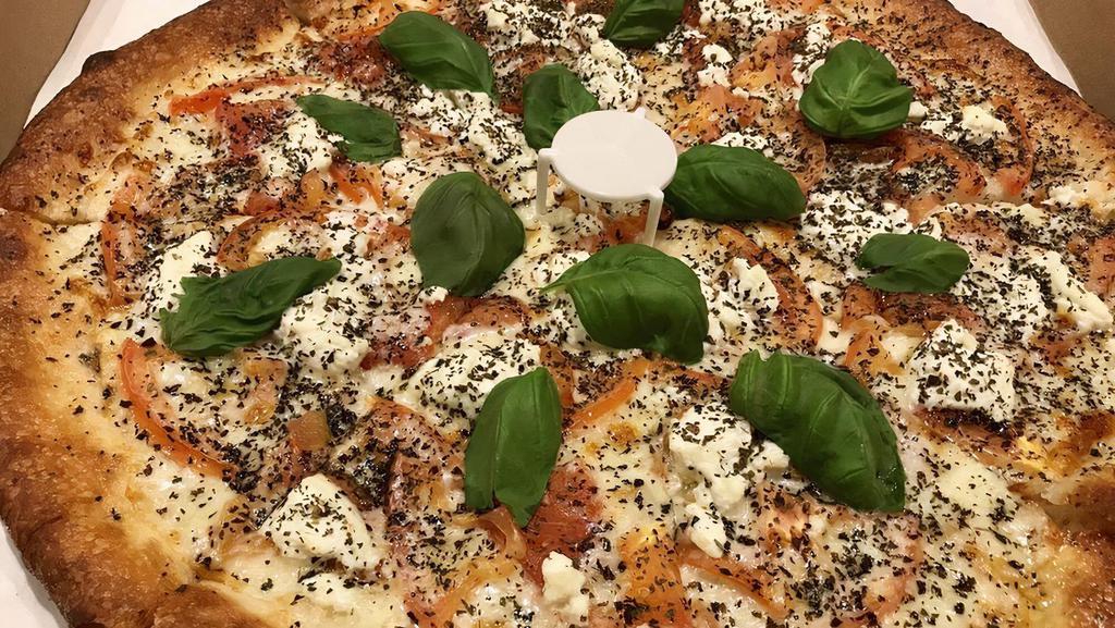 White Rock Pizza (Medium 12') · Eight slices. Olive oil garlic sauce, mozzarella cheese topped with fresh tomato, garlic, ricotta cheese and topped with dry and fresh basil.
