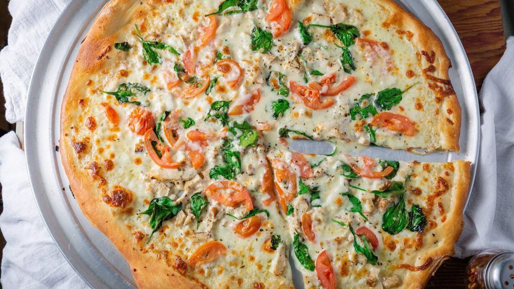 Spring Chicken Pizza (Medium 12') · Eight slices. Buttermilk ranch sauce, mozzarella cheese topped with grilled garlic chicken and topped with dry and fresh basil.