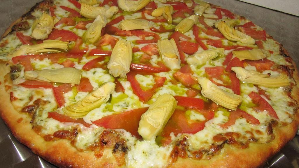 Placer Pesto Pizza (Medium 12') · Eight slices. Basil and garlic pesto sauce, mozzarella cheese topped with fresh tomato, and artichoke.