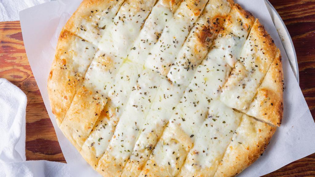 Cheese Bread Sticks · Medium size dough-ball, basted with garlic butter, topped with mozzarella cheese, and baked in our brick oven.