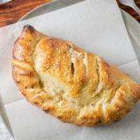 Calzone · Our delicious dough stretched thin, stuffed then folded in half, and baked. Ricotta cheese, ...