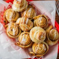 Cinnamon Sugar Rolls · Our dough stretched and braided, basted with butter, loaded with cinnamon & sugar. Baked to ...