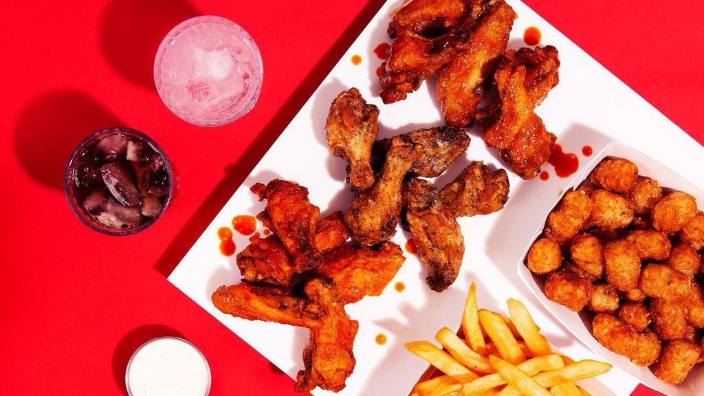 The Zak · 15 crispy fried chicken wings with a choice of 2 sides.