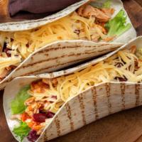 Kids Bean & Cheese Burrito · Flour tortilla, cheese, beans, rice and beans or French fries.