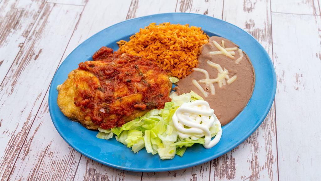 Chile Relleno Plate · Fried green chile stuffed with cheese and topped with our homemade mild salsa and served with tortillas.