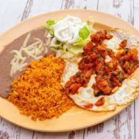 Ranchero Shrimp Plate · Shrimp cooked with bell pepper, onion and tomato served with beans, rice, lettuce and tortil...