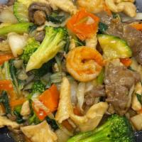 Happy Family · Combination of chicken, beef & shrimp sauteed with mixed vegetable in light brown sauce.