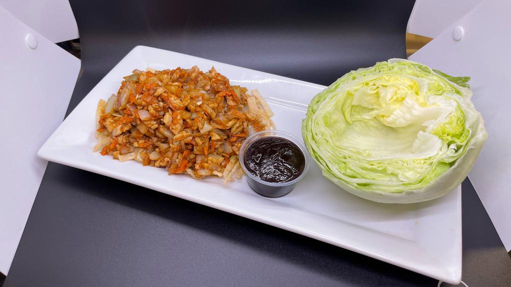 Chicken Lettuce Wraps · A wok-cooked mixture of minced chicken, water chestnut, onion & carrots, wrapped in fresh lettuce.