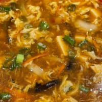 Hot & Sour Soup · Shredded pork, onion, bamboo shoots, tofu & carrots.