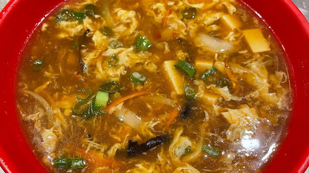 Hot & Sour Soup · Shredded pork, onion, bamboo shoots, tofu & carrots.